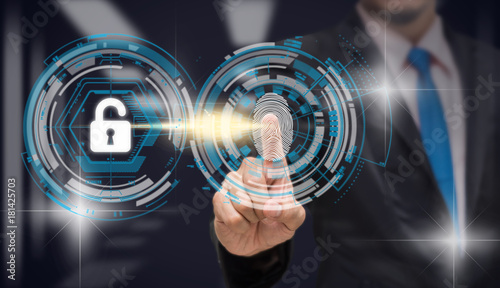 Fotografía Businessman Fingerprint scan for biometric authentication to unlock security over the blurred data center server room background, Business Technology sceurity Concept