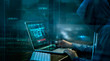 © ipopba - Cyber attack or computer crime hacking password on a dark background.