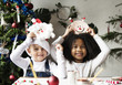 Happy kids with their DIY Christmas projects