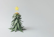 Christmas Tree Made Of Pineapple Leaves And Christmas Decoration. Holiday Concept.