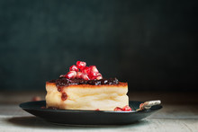 Cheesecake With Berries Jam And Pomegranate