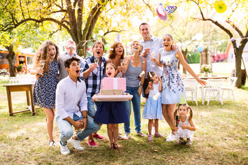 Wall Mural - Family celebration or a garden party outside in the backyard.