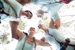 © WavebreakMediaMicro - Happy friends forming huddle