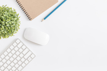 Wall Mural - flat lay photo of office desk with mouse and keyboard,white copyspace with pencil top view