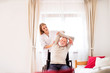 © Halfpoint - Nurse and senior man in wheelchair during home visit.