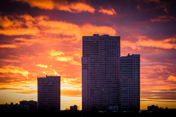 Modern residential building at sunset