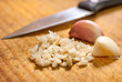 © Bruno R.B S. - Finely cut garlic over wooden cutting board
