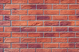 Fototapeta  - Wall of orange tile as brickwork (background, texture)