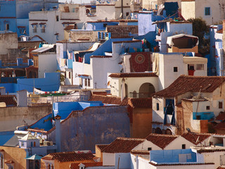 Wall Mural - The gorgeous blue alleyways and blue-washed building of Chefchaouen, Morocco - amazing palette of blue and white buildings