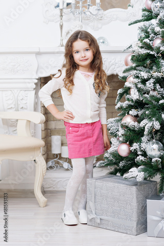A Nice Little Girl Of Seven With Chestnut Curly Hair With A