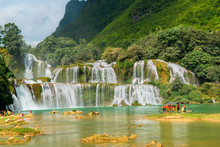 Amazing Ban Gioc Waterfall Flow Down Fluted In Cao Bang Province, Vietnam.  Ban Gioc Waterfall Is One Of The Top 10 Waterfalls In The World And Along Vietnamese And Chinese Border