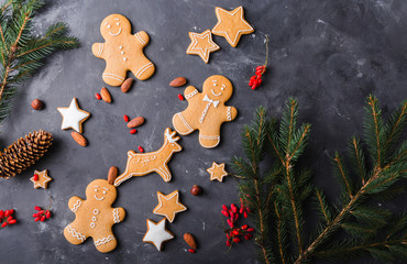 Wall Mural - Gingerbread  cookies on a gray background.  Christmas cookies.  Ginger men