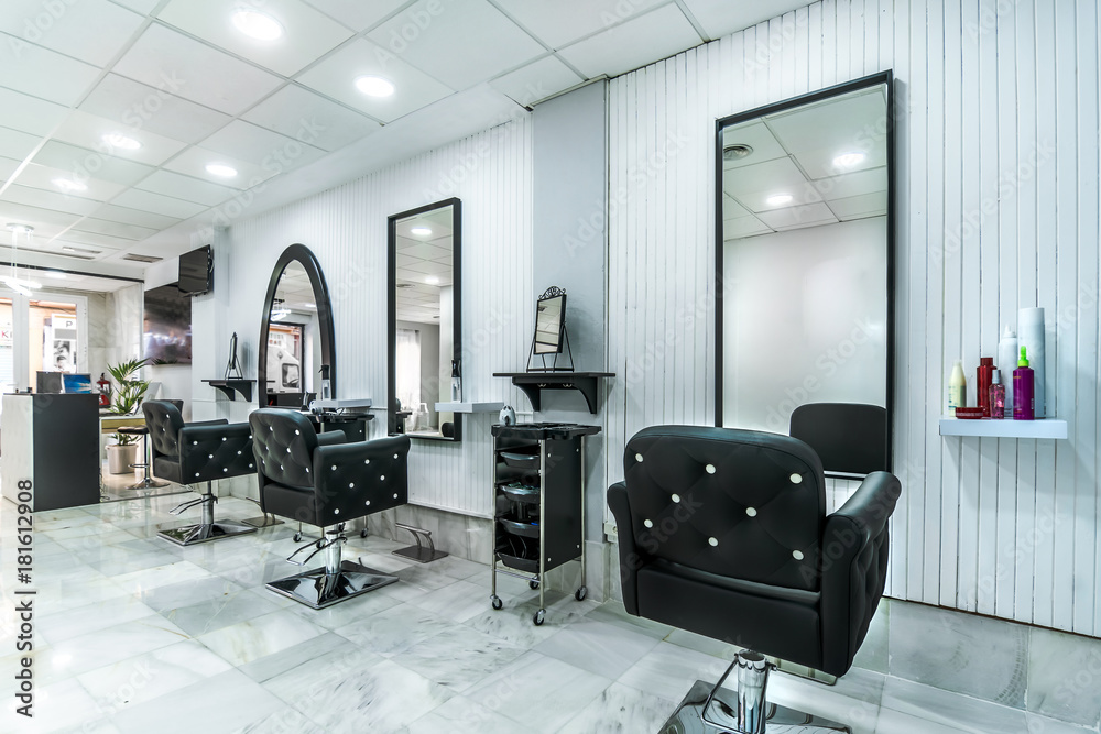 Modern bright beauty salon. Hair salon interior business - obrazy, fototapety, plakaty 