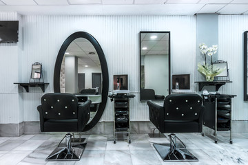 Modern bright beauty salon. Hair salon interior business