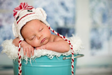 Portrait Of A Newborn Baby Boy,l Wearing Christmas Hat, Sleeping