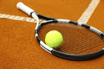 Canvas Print - Tennis racket and ball on court