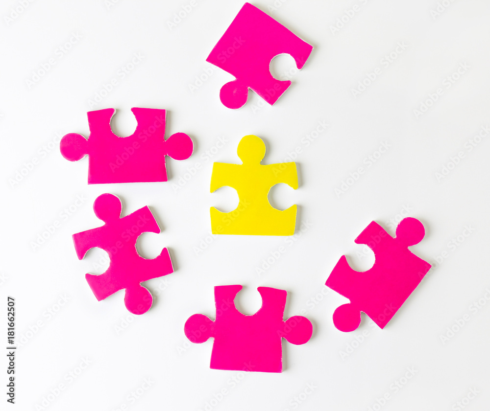 Puzzle pieces on white background as symbol of autism