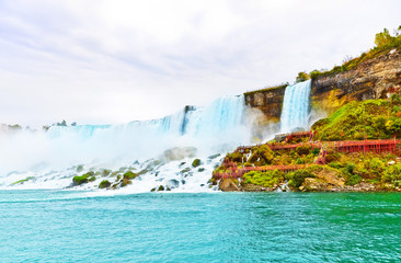 Wall Mural - american side of niagara falls on a cloudy day in autumn.