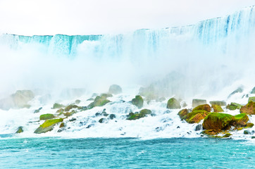 Wall Mural - american side of niagara falls on a cloudy day in autumn.