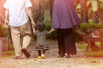 Wall Mural - Muslim families, husbands, wives and children. They were walking