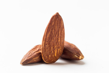 Closeup of almonds, isolated on the white background