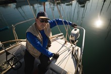 Yachtsman Sitting On The Boat