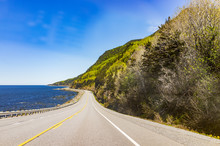 Coast Of Gaspesie Region Of Quebec, Canada With Road, Cliffs And Saint Lawrence River Ocean