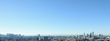 Fototapeta Zwierzęta -  日本の東京都市景観・雲一つない澄み切った青空「新宿の高層ビル群（画面左）や池袋の高層ビル群（画面右）などを望む」