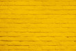 © ParinPIX - Yellow brick wall texture and background.