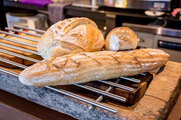 Fresh french bread on the grill in bakery shop