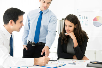 Wall Mural - Business people discussing finance reports in the meeting