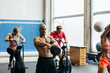 © ADDICTIVE STOCK - People working out in gym