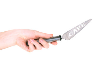 kitchen spatula for cake in hand