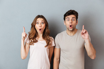 Canvas Print - Portrait of a happy surprised couple