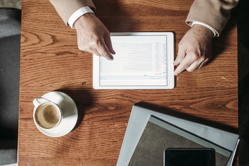 Wall Mural - Businessman Using Tablet