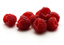Red Raspberries Isolated On White Background Heap.
