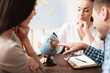 © VadimGuzhva - A young man and a woman came to the travel agency.