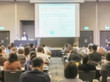 © kenkuza - Motion blur of view of seminar with audience in a seminar room