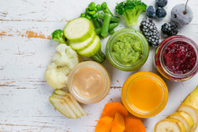 Colorful Baby Food Purees In Glass Jars