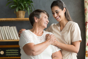 Wall Mural - Senior woman and younger friend