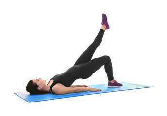 Poster - Young sporty woman doing exercise on white background