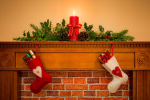 Christmas Stockings Hanging On The Fireplace