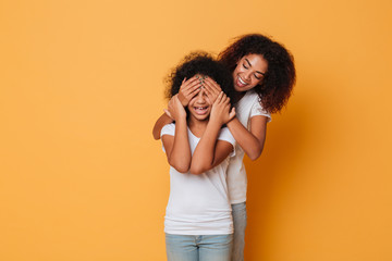 Canvas Print - Two happy afro american sisters having fun