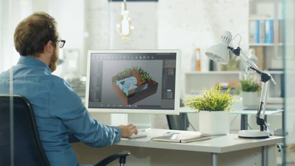 Poster - Video Game Designer Works on a New 3D Level on His Personal Computer. He Works as a Developer in a Modern and Bright Creative Studio Environment.
