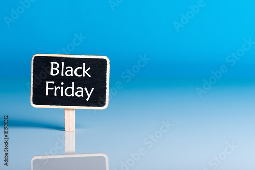 Poster Black Friday shopping sale concept with little wooden tag