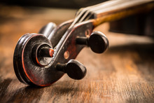 Violin In Vintage Style On Wood Background