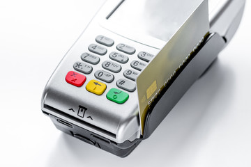 purchasing concept with card payment and terminal on table backg