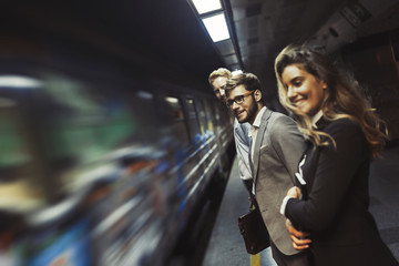 Business people waiting for subway