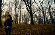 © candreea - Woman enjoying a forest trip in the park Herastrau, in Bucharest, Romania