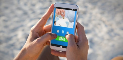 Poster - Composite image of person putting coin in piggy bank 